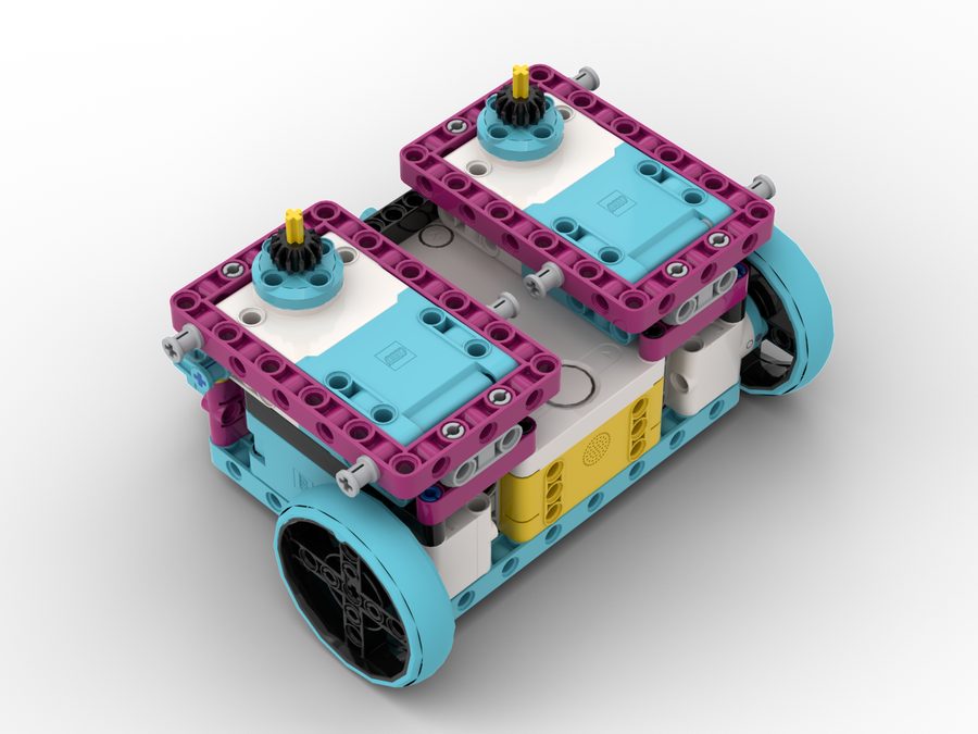 Marcus Bot — a very compact SPIKE Prime robot base, with the attachment motors partially covering the hub